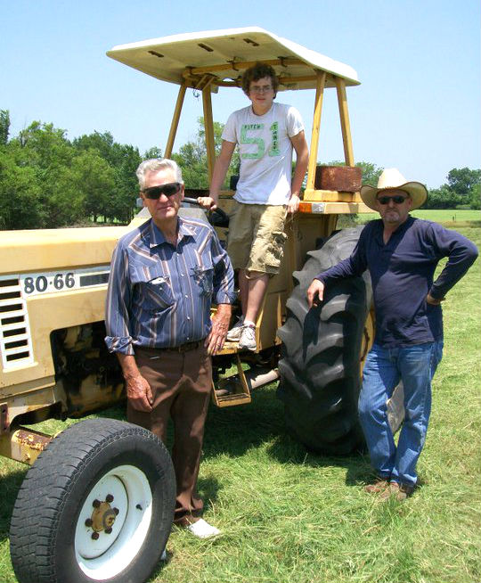 Pct. 2 Commissioner Wade McKinney (far right) poses with his father and his son.
