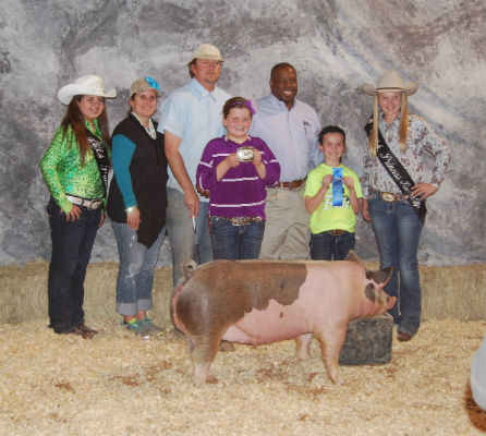 Landrey Rogers wins Grand Champion Breeding Swine for third time