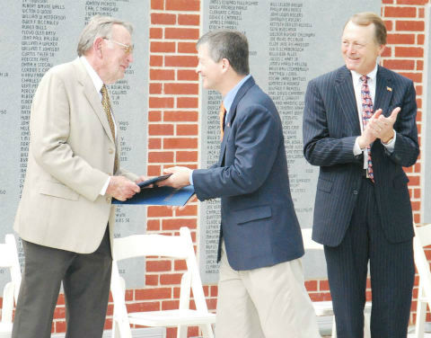 Congressman Jeb Hensarling (center) presents Bob McDonald (left) with a proclamation while Steve Grant looks on. (MICHAEL V. HANNIGAN PHOTO)