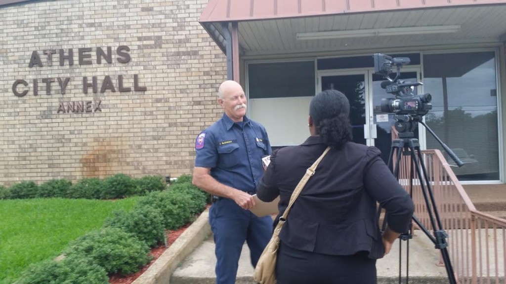 CUTLINE: Athens Fire Chief John McQueary speaks to CBS 19 reporter Katiera Winfrey after Monday night's City Council meeting.