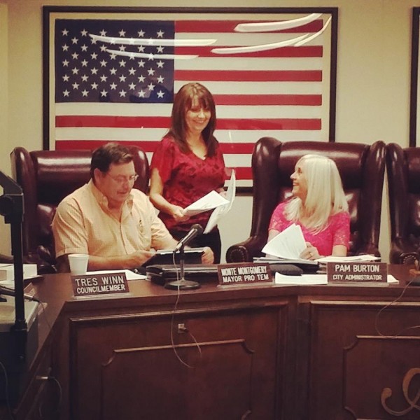 FILE PHOTO: Athens City Administrator Pam Burton, right, prepares for a City Council meeting with City Secretary Pam Watson and City Councilman Monte Montgomery.