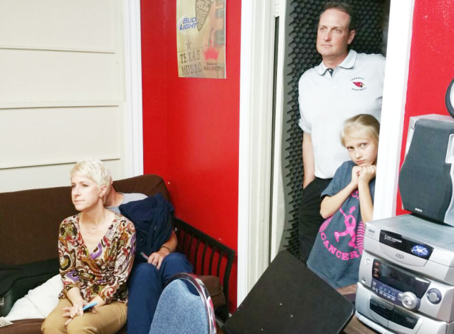 Parents listen to the band.