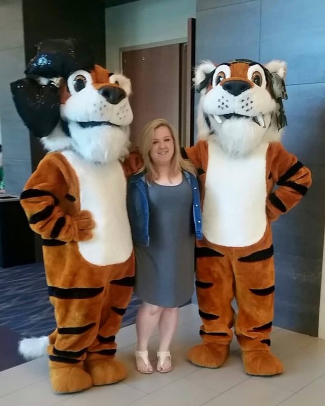 Meaghan Paige Morton stands with the Malakoff High School mascots in Waco this week. (Courtesy photo)