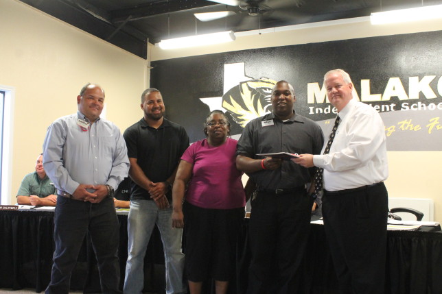 From left: Brookshire's personnel Darrell Gunstanson, Jackson Blackateer, Bea Anderson, and Brookshire's Store Manager Billy Williams with Superintendent Randy Perry. (Courtesy photo)