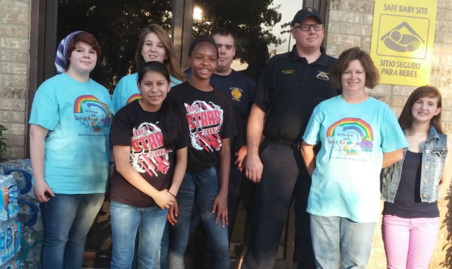 Pictured, from left, Tara Trimmins (Worthy Advisor), Marie (guest), Emily Currey, Alexis (guest), two GBC Firemen,  Mrs. Tonya Currey (Mother Advisor), and Nicci Ferguson. 