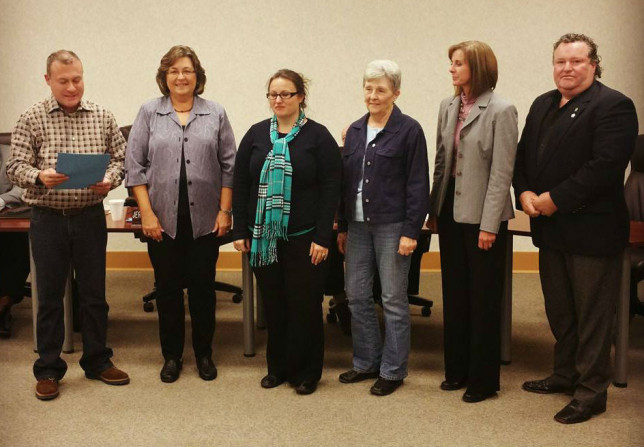 Mayor Jerry Don Vaught, left, proclaims Nov. 14 America Recycles Day in Athens. He is pictured here with members of the Keep Athens Beautiful board.