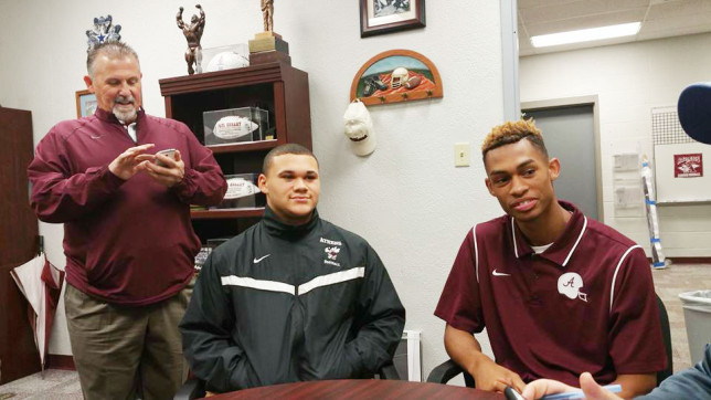 From left, Coach Paul Essary, Logan Fuller, Travon Fuller.