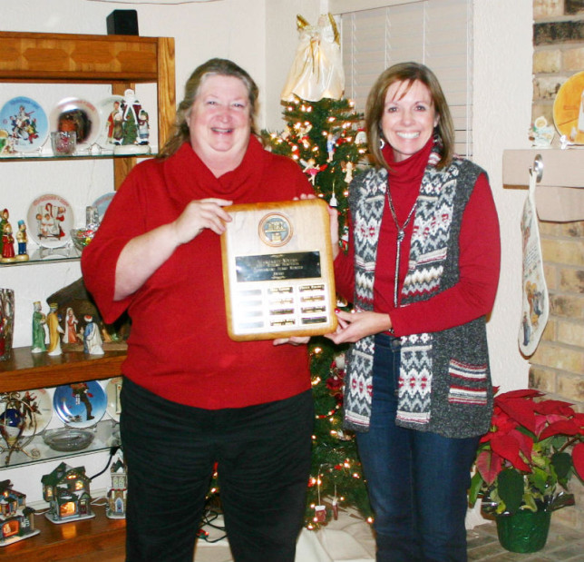 Keep Athens Beautiful President Peggy Rhodes presents Kelly Driskell with the Margaret Myers award. (Courtesy photo)