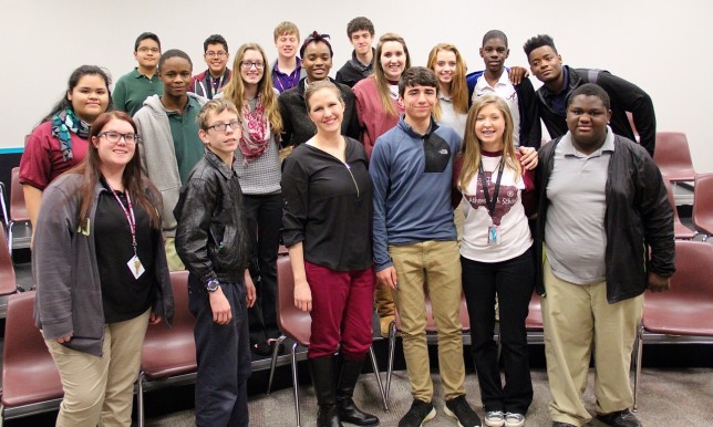 Athens High School Choir Director Bridget Scott (front row, center) stands with a few of the 80 students in the school’s choral program. The choir program is growing by leaps and bounds. “I’d love to have even more students … experience this joy,” said Scott. (Toni Garrard Clay/AISD)