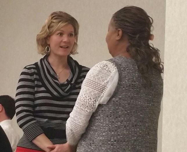 Athens Director of Development Amy Williams, left, speaks to City Secretary Bonnie Hambrick. Williams last day with the City is April 22.