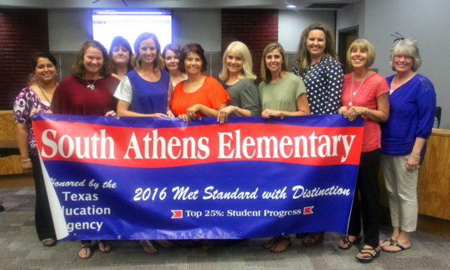 South Athens Elementary is presented with a banner of achievement proclaiming that the campus has been distinguished in the area of student progress. (Courtesy photo)